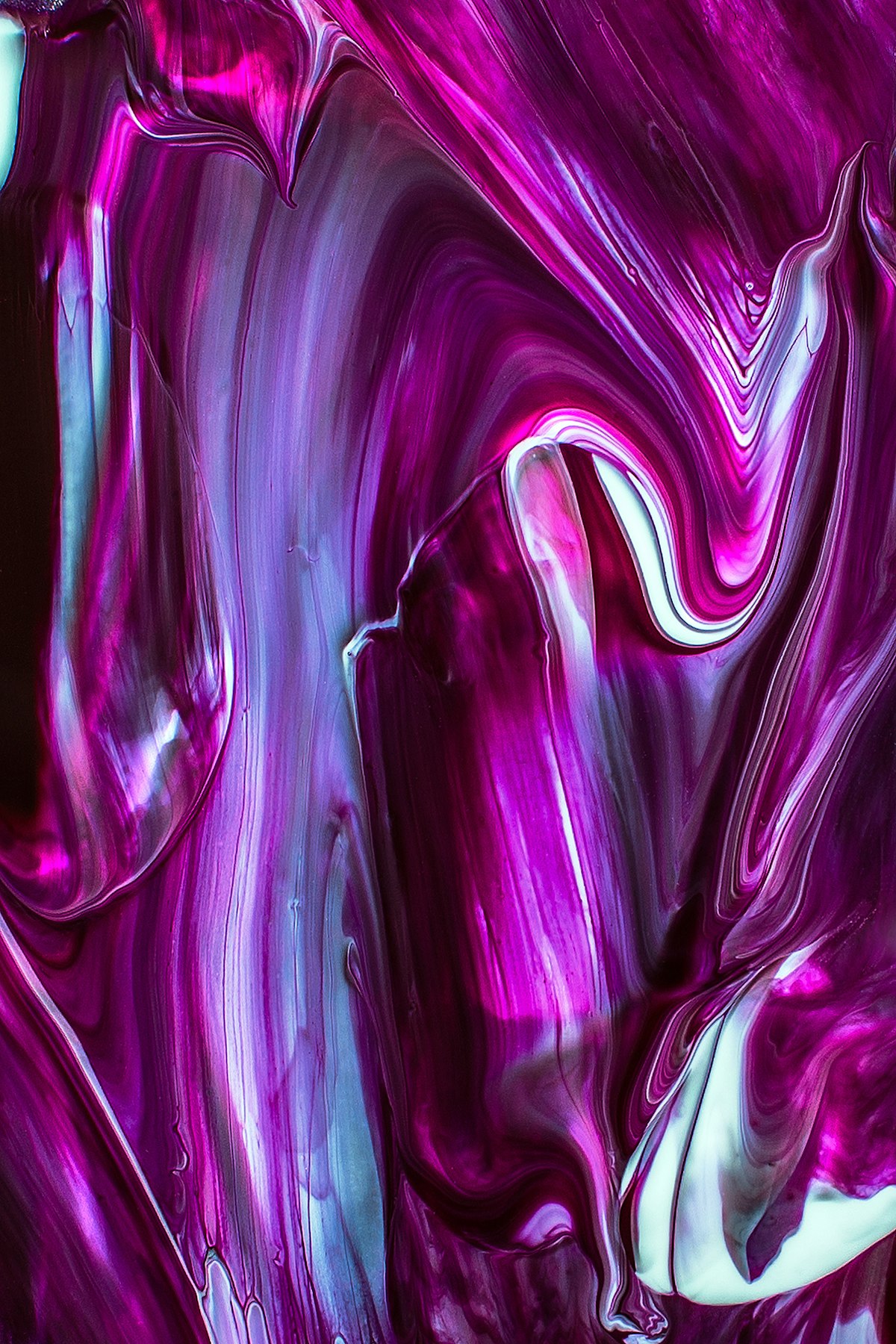Layered abstract patterns in cool tones suggesting depth and complexity